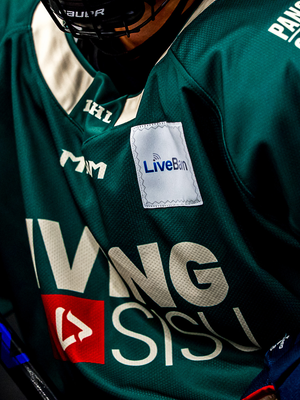 The green LSHL jersey on the ice, LiveBarn team patch and Pancreatic Cancer North America shoulder mark